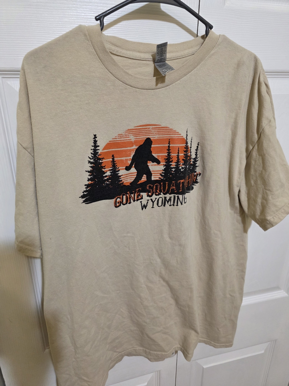 Gildan Beige 'Gone Squatchin' Wyoming' Graphic Tee with Orange Sunset